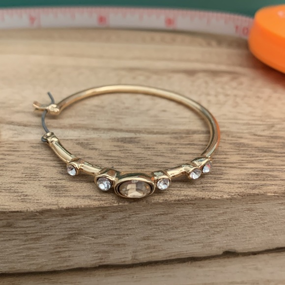 Gold toned hoops with clear crystals highlighting a center taupe crystal, new - Picture 2 of 3